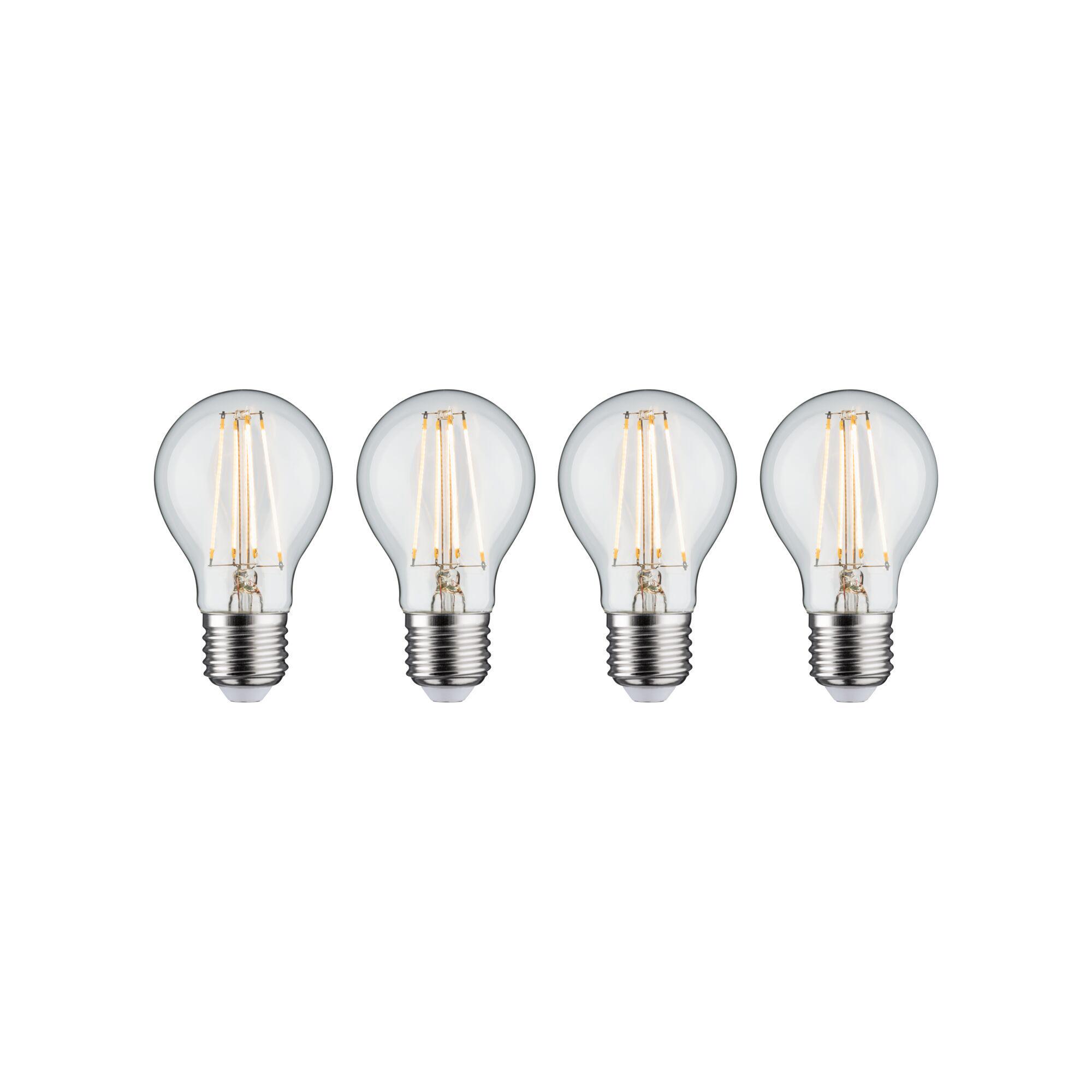 Four clear LED bulbs with E27 base emitting warm white light for energy-efficient lighting