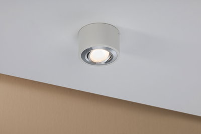 Round white ceiling light with silver trim and warm white LED for modern interior lighting
