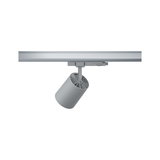 Moderner grauer LED-Strahler aus Metall an Schienensystem für flexible Beleuchtung im Innenraum