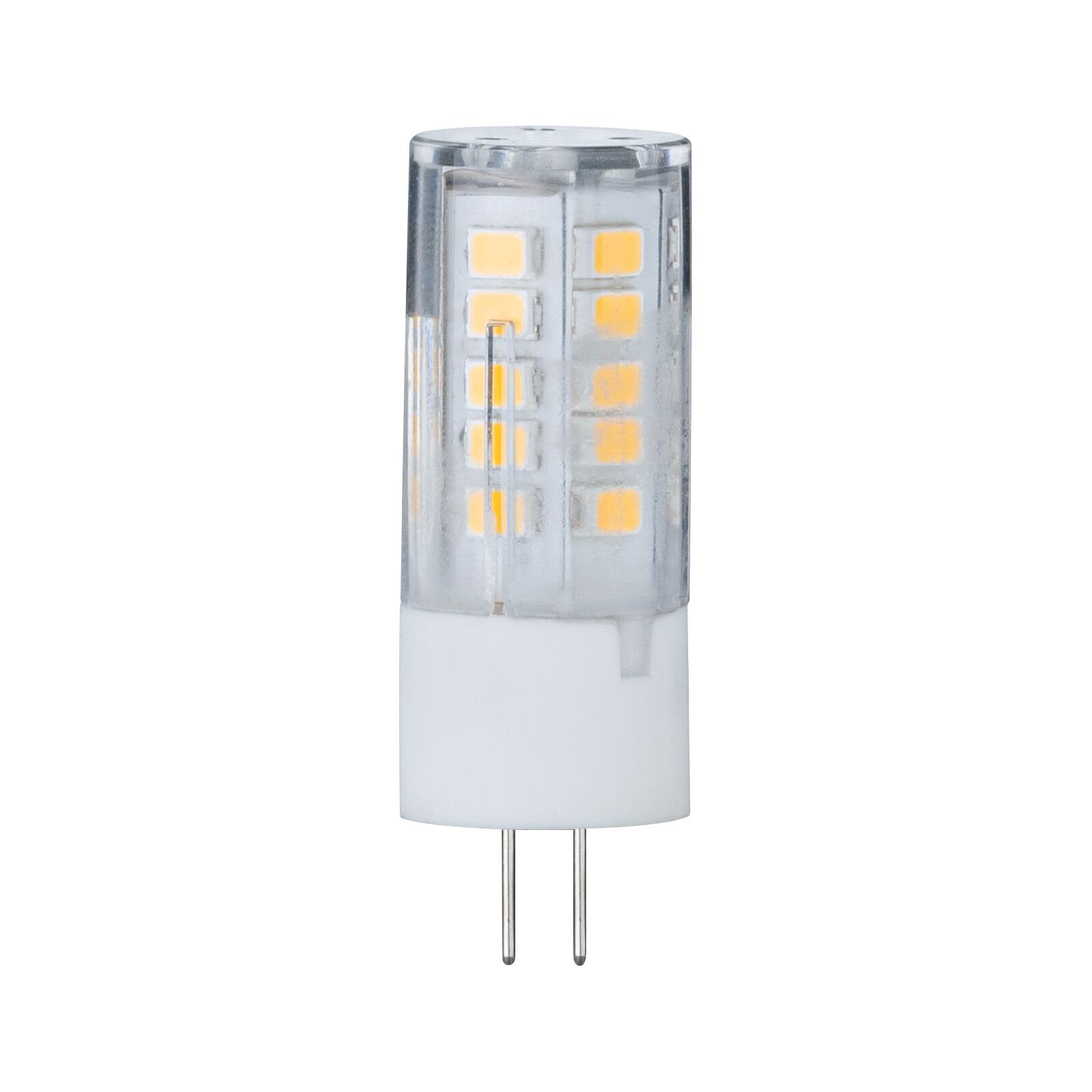 Small LED lamp with transparent plastic housing and two metal pins for energy-saving lighting