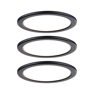 Three round black LED recessed lights with white illumination for modern indoor lighting.