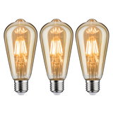 Drei vintage LED-Glühbirnen mit bernsteinfarbenem Glas und E27-Fassung für dekorative Beleuchtung