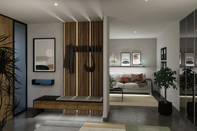 Moderne woonkamer met houten paneel, bank en indirecte LED-verlichting voor een gezellige sfeer