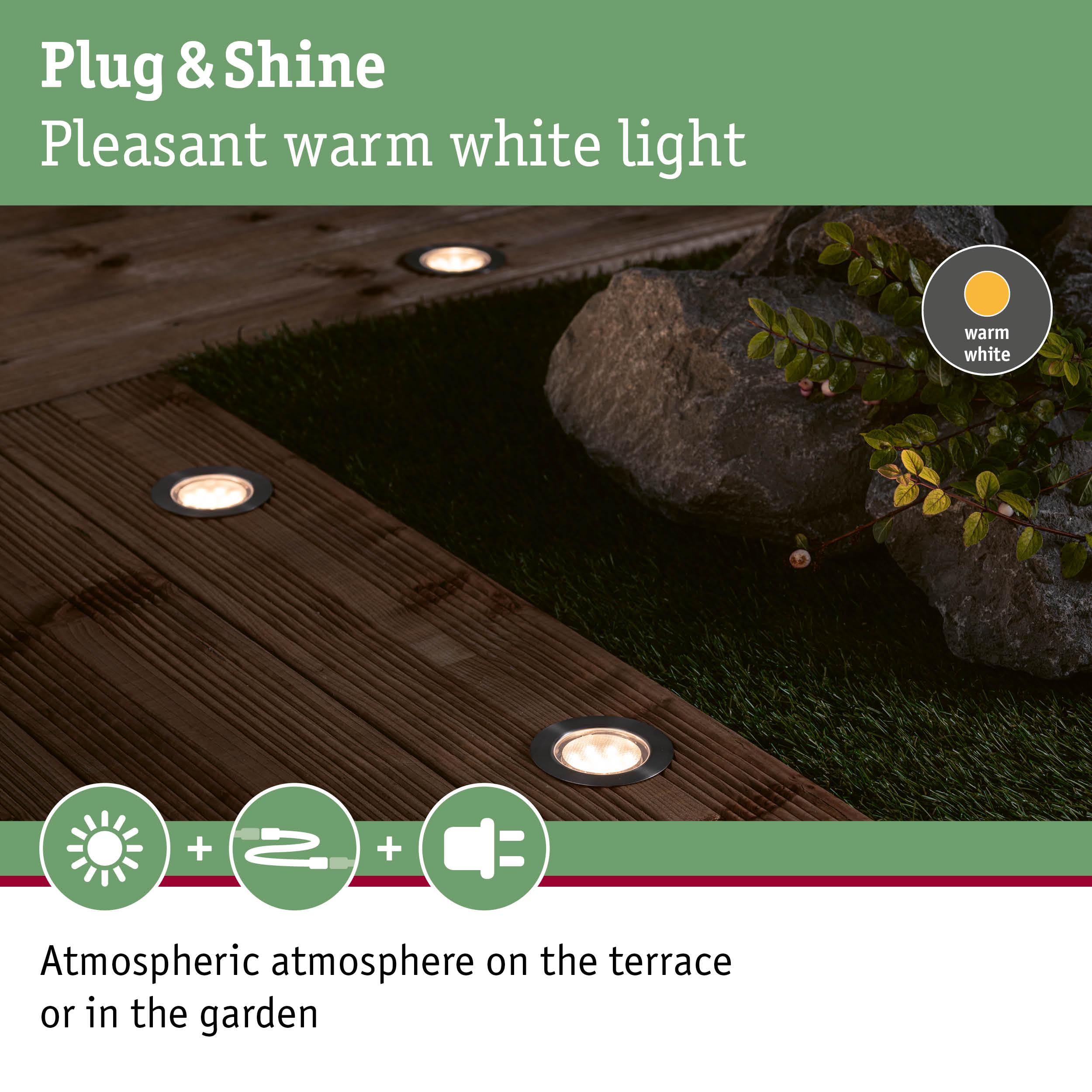 Recessed warm white lights in wooden terrace creating atmospheric garden and terrace lighting