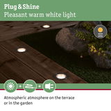 Recessed warm white lights in wooden terrace creating atmospheric garden and terrace lighting