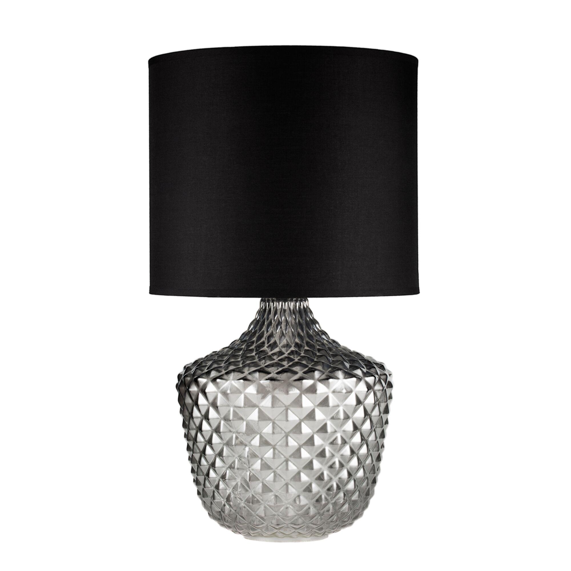 Table lamp with black fabric shade and textured clear glass base for stylish home lighting