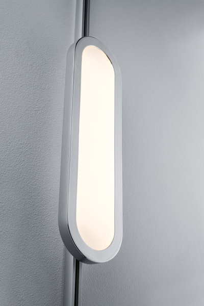 Modern white oval LED wall light with warm white illumination for living spaces