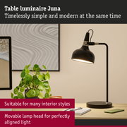 Black Juna metal table lamp with adjustable head for flexible lighting in office spaces