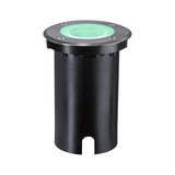 Round black metal LED ground recessed light with green illumination for outdoor use