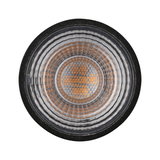 Close-up of round LED light with black frame and textured glass for accent lighting in interiors