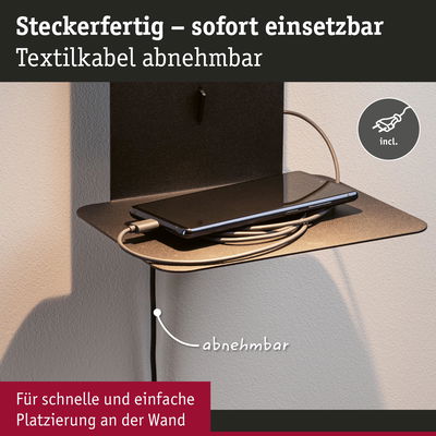 Schwarzes Wandregal mit abnehmbarem Textilkabel und Smartphone für einfache Platzierung und Laden