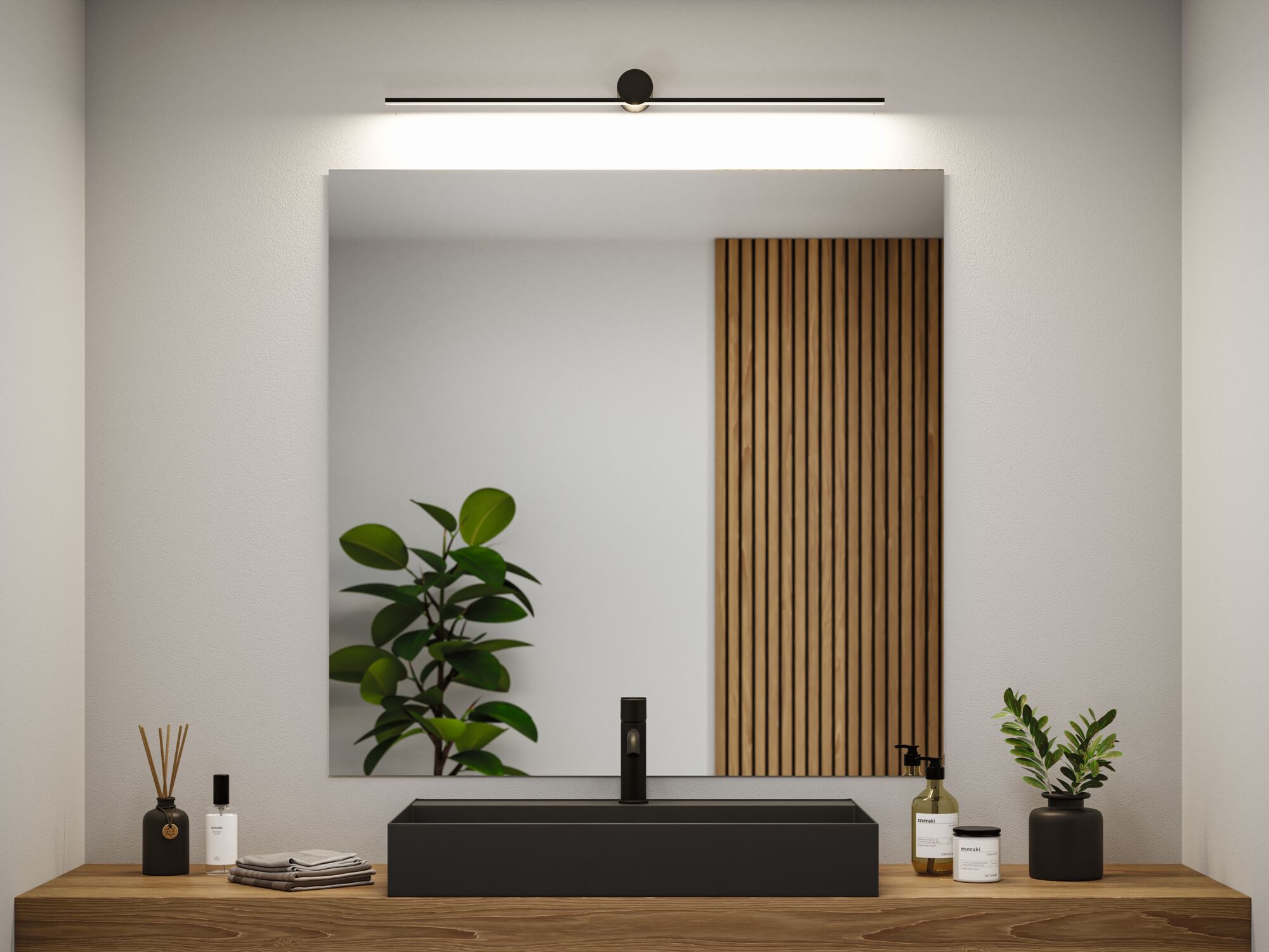 Modern bathroom with black rectangular sink and LED mirror light above wooden countertop