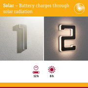 Solar-powered house number light with white casing and LED illumination for energy-saving outdoor lighting
