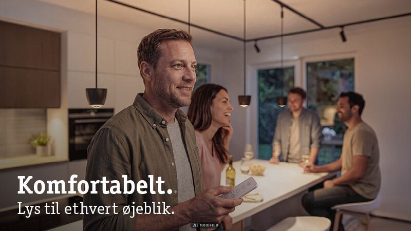 Moderne køkken med varm hvid LED-pendelbelysning og fjernbetjening til komfortabel lysstyring