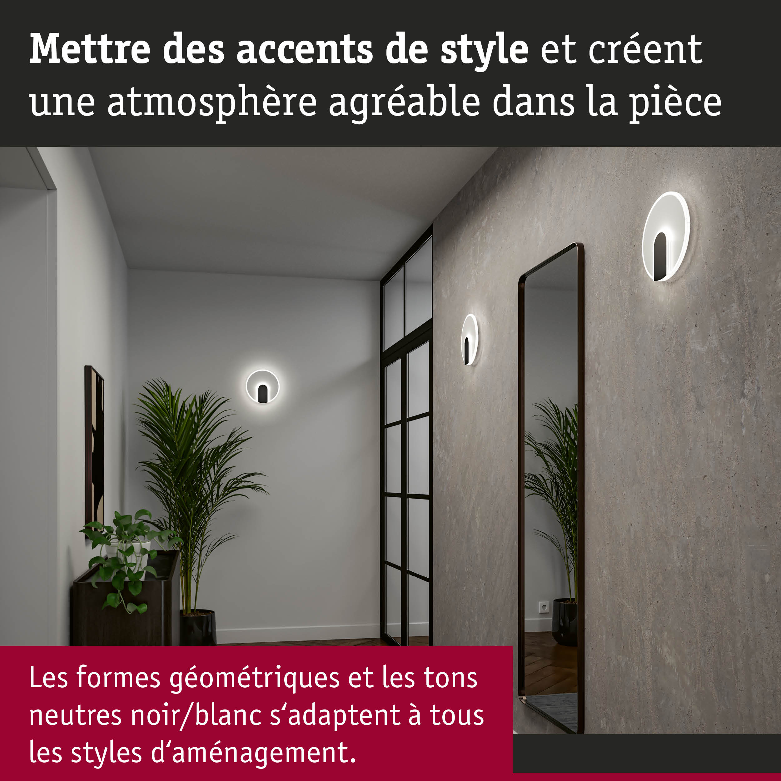 Appliques murales LED rondes noires et blanches au design géométrique dans un couloir avec miroir et plantes
