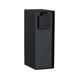 Black outdoor metal socket with IP44 protection for weatherproof electrical installation in garden