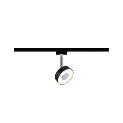 Black LED spotlight with round white illuminated front on black metal track lighting