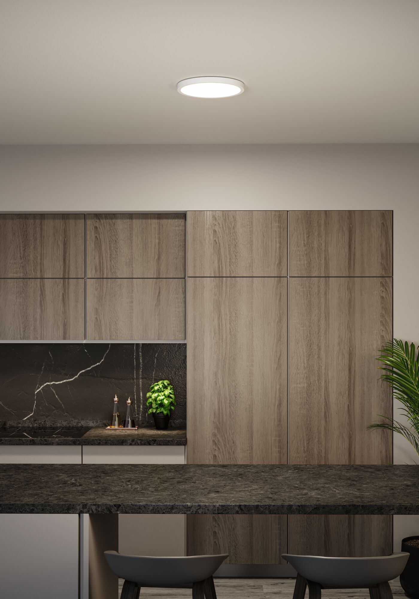 Runde weiße LED-Deckenleuchte in moderner Küche mit Holzfronten und schwarzer Arbeitsplatte