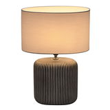 Lampe de table avec base en céramique rayée noire et abat-jour en tissu clair pour éclairage d'ambiance