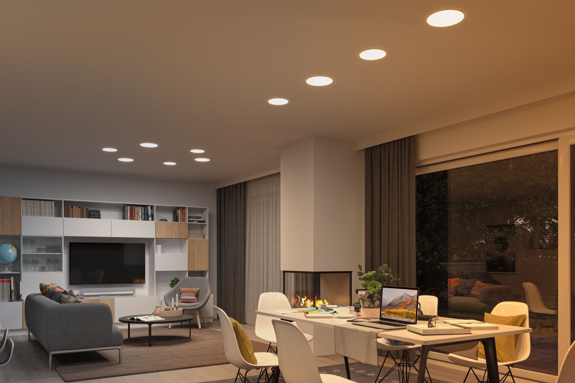 Modern living room with white LED recessed lights and cozy fireplace providing warm ambient lighting.