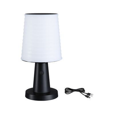 Modern table lamp with black plastic base and white lampshade, includes USB charging cable