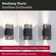 Zwarte metalen wandlamp Tharin met verstelbare lichtbundel en warmwit lichtaccent