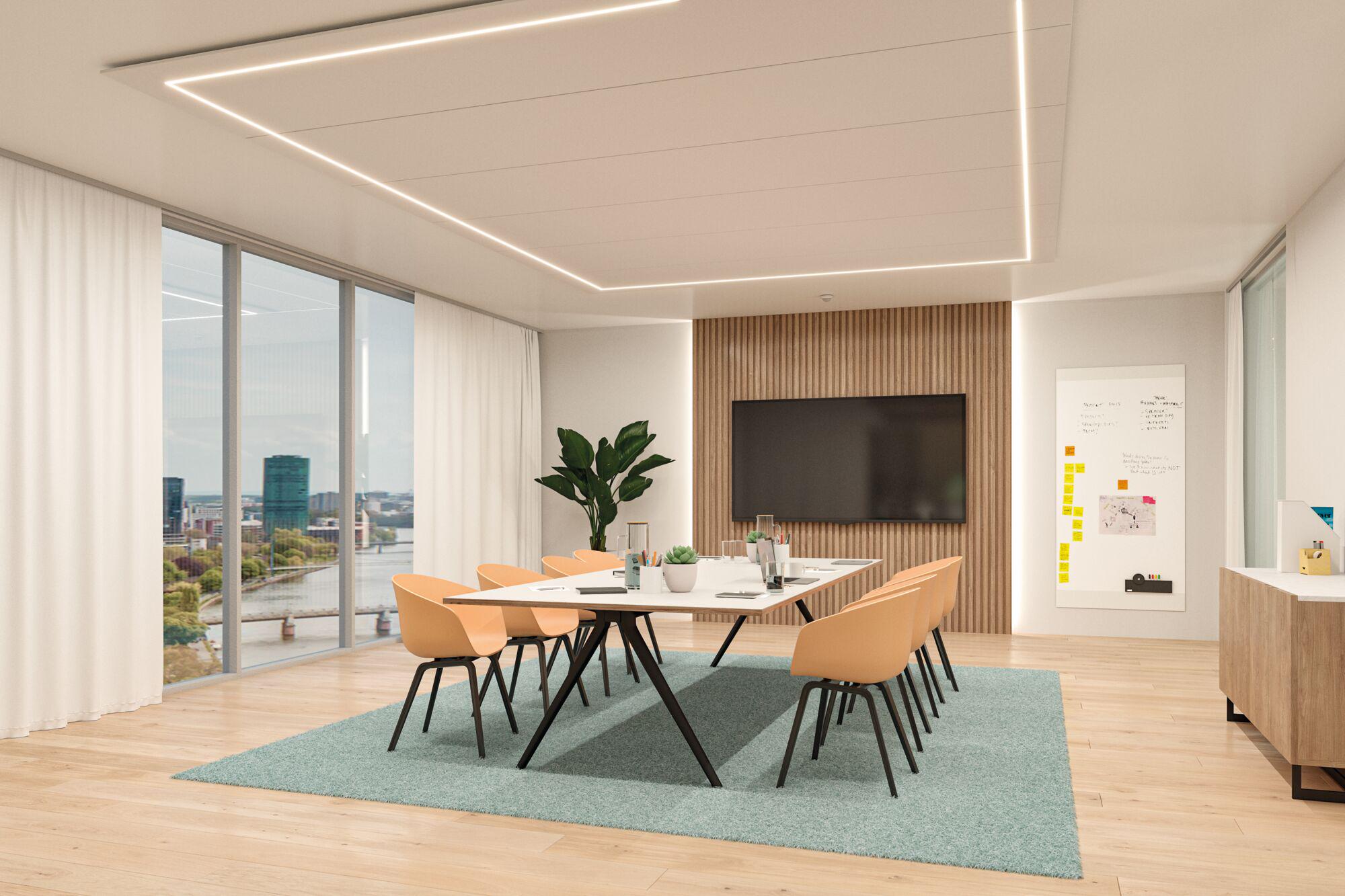 Modern office with rectangular table, orange chairs and LED ceiling lighting in bright room