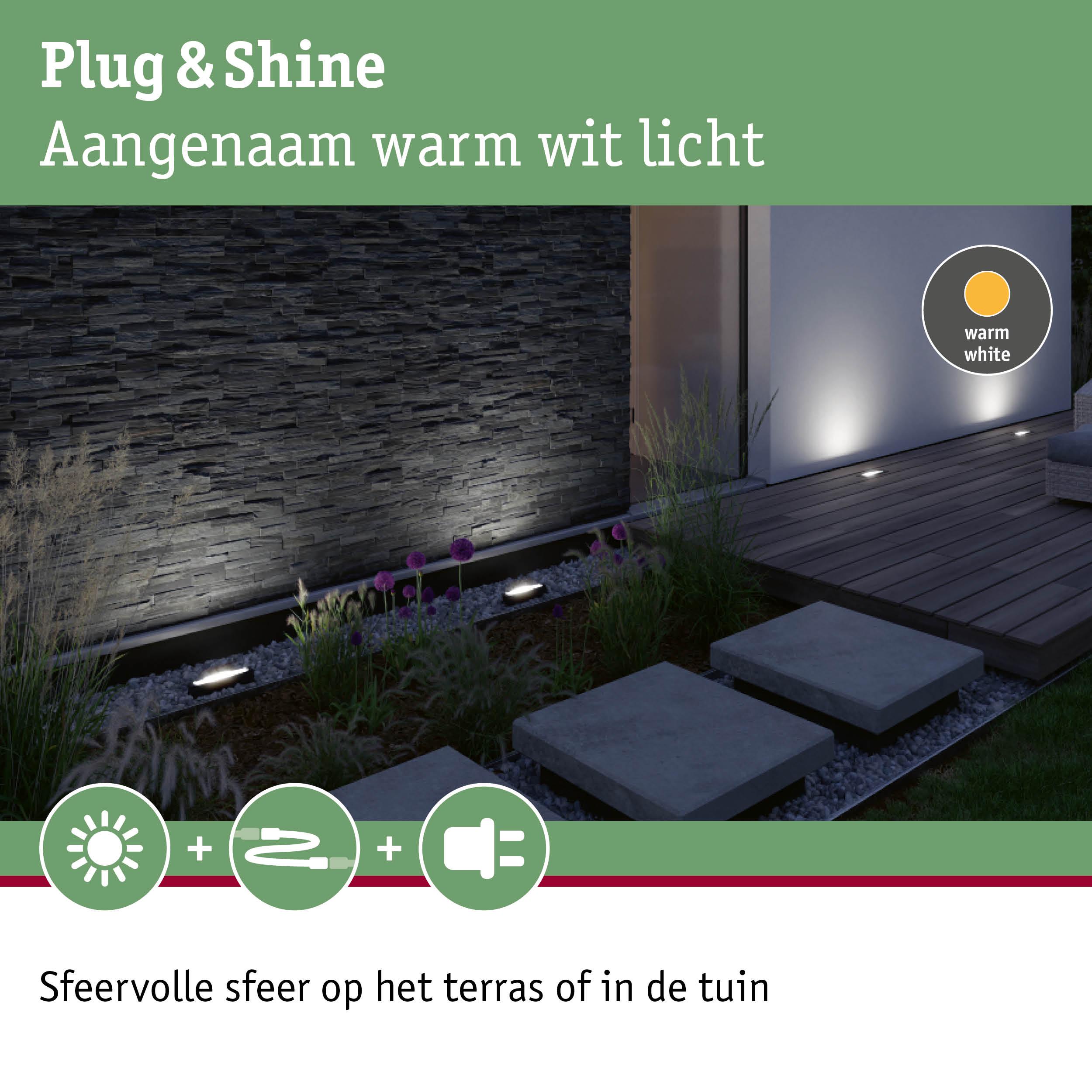 Warm wit LED-grondlicht in moderne tuin met stenen pad en terras voor sfeervolle buitenverlichting