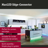 Modern kitchen featuring MaxLED Edge-Connector LED lighting under white cabinets and island with colour-changing lights
