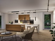 Modern kitchen with wood cabinets and black LED track lighting for stylish ambient light