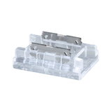 Transparent plastikforbinder med metalcontakter til elektriske forbindelser