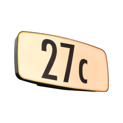 Illuminated house number sign 27c in black on warm white plastic for outdoor lighting