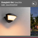 Schwarze Außenwandleuchte mit warmweißem Licht an weißer Wand, Komplett-Set mit Leuchtmittel