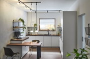 Modern white kitchen with wooden countertops and black LED track lighting for stylish cooking space