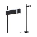 Moderne vloerlamp met zwarte vilten kap en metalen frame, dimbare LED-verlichting voor woonkamer.