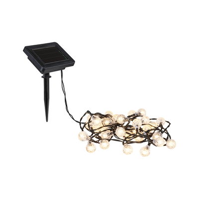 Solar-powered LED string lights with clear bulbs and black ground stake for outdoor lighting