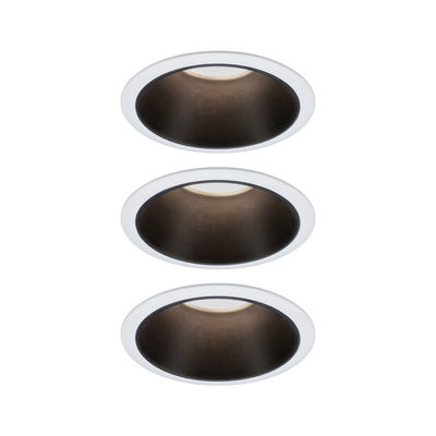 Three white recessed spotlights with black metal inner ring for modern LED ceiling lighting