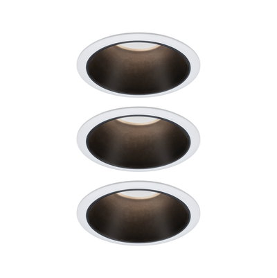 Three white recessed spotlights with black metal inner ring for modern LED ceiling lighting