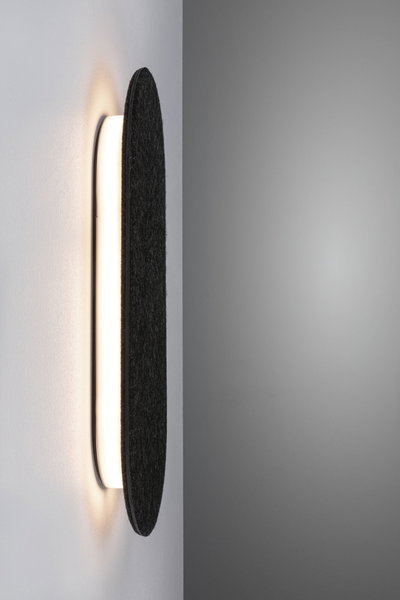 Modern wall lamp with black felt and warm white LED light for stylish room illumination