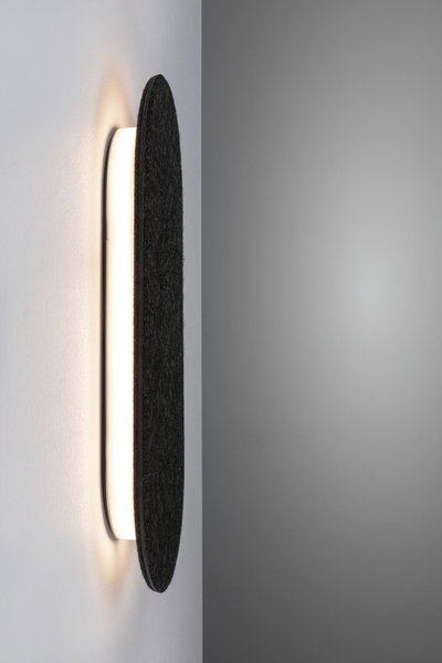 Modern wall lamp with black felt and warm white LED light for stylish room illumination