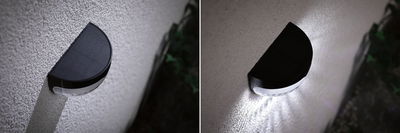 Applique murale solaire noire en plastique semi-circulaire sur mur blanc, vue jour et nuit avec éclairage LED.