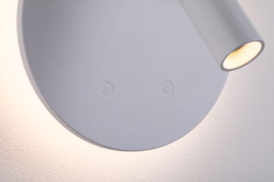 Grey LED wall lamp with round base and two touch switches for modern lighting design