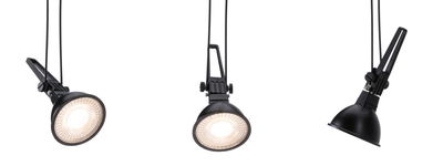 Three black LED spotlights with adjustable mounts and warm white light for modern indoor lighting