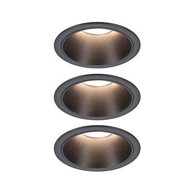 Three round recessed lights in matte black with warm white LED for modern interior lighting
