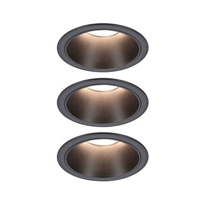 Drei runde Einbauleuchten in mattem Schwarz mit warmweißem LED-Licht für moderne Raumbeleuchtung