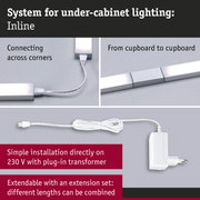 Silver Inline under-cabinet lighting system with plug-in transformer and connecting cable for kitchen use
