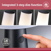 Black LED table lamp with white ribbed shade and integrated 3-step dim function controlled by button