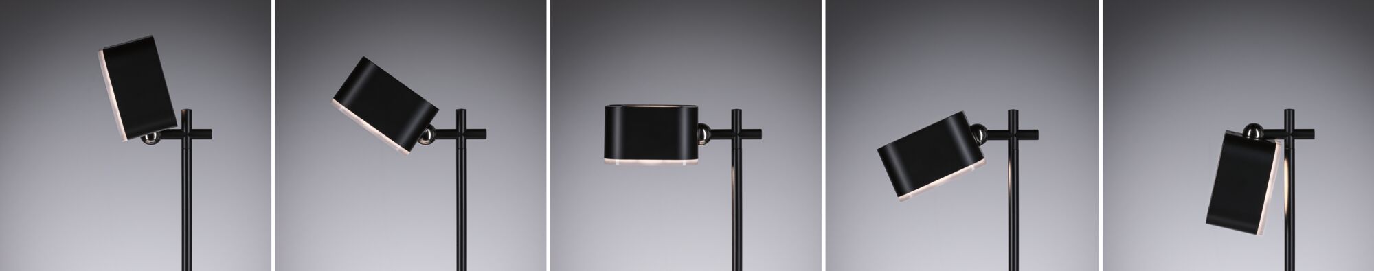 Lampadaire en métal noir avec abat-jour rectangulaire réglable et lumière LED blanc chaud.