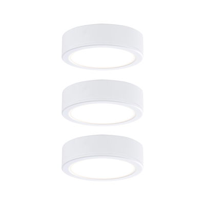 Drie ronde witte LED-plafondlampen van kunststof met warm wit licht voor moderne interieurs