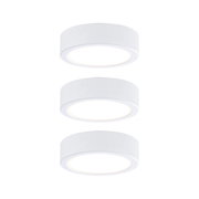Three round white LED ceiling lights made of plastic with warm white light for modern interiors